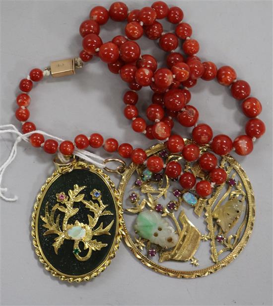 A Chinese 18ct gold and multi gem set pierced circular pendant, one other pendant and two items of coral.